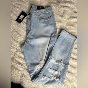 Light wash Fashion Nova Ripped Jeans
